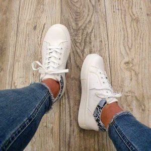 Witte sneakers met blauw/grijze slangenprint