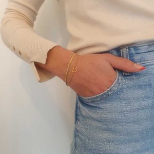 Dubbele goudkleurige armband met hartje